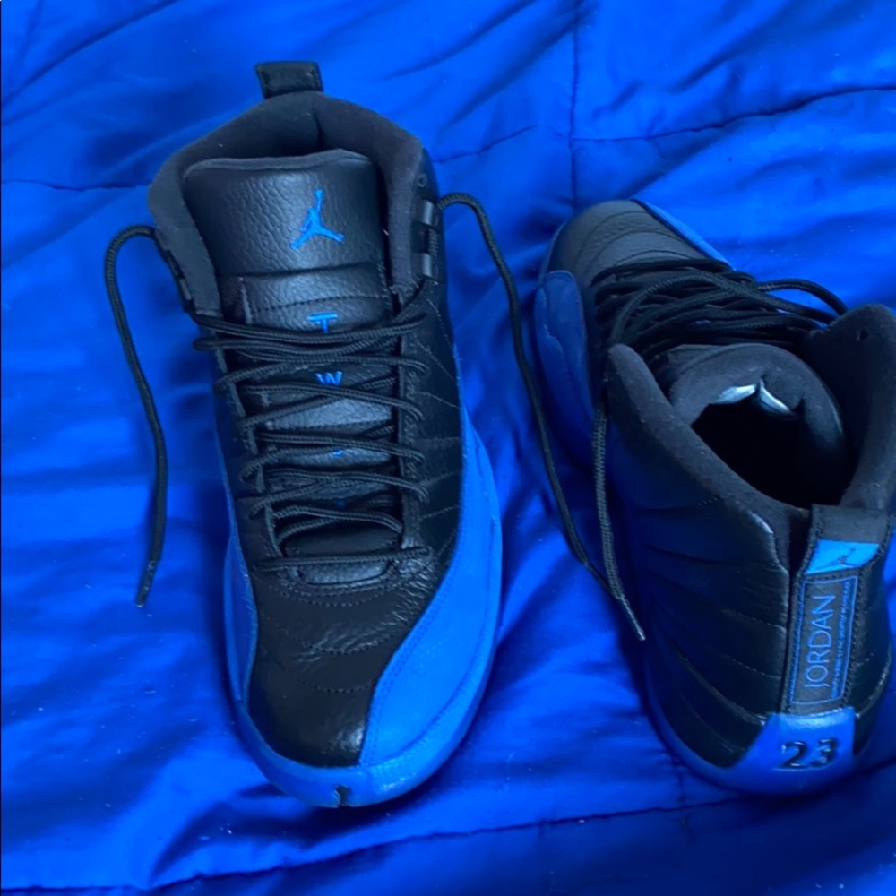 Blue and black Jordan 12s